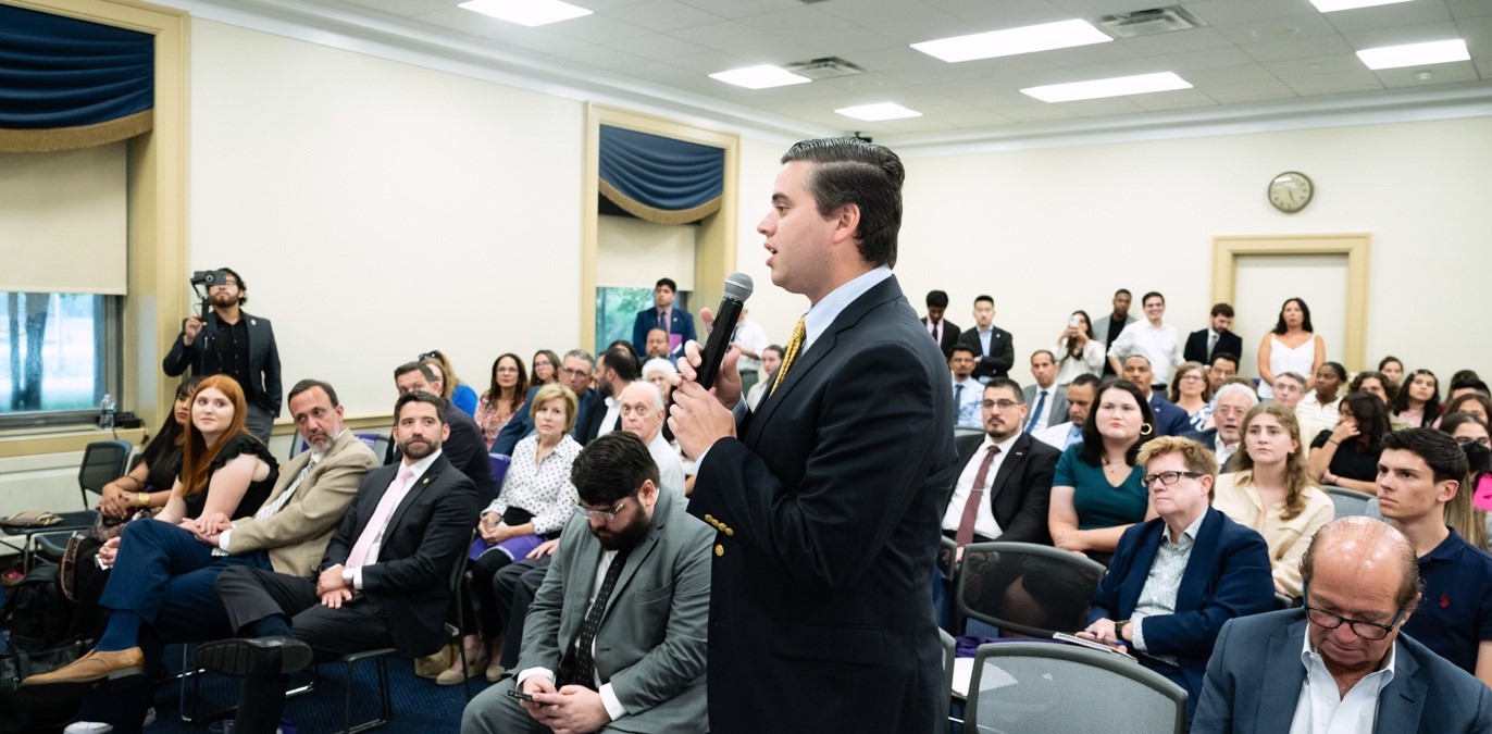 Pictured: Attendees engaged in thoughtful Q&A session