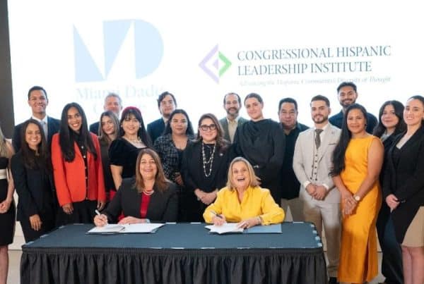 Group photo at signing event.